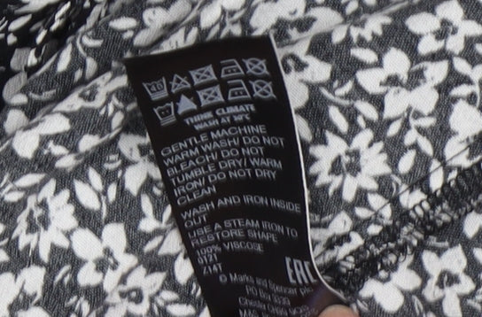 Brand and care label for Marks & Spencer Floral Shift Dress, size 12, Black