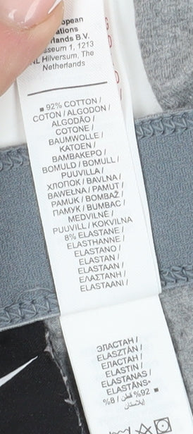 Brand and care label for Nike girls’ grey ankle athleisure leggings m