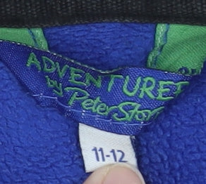 Brand and care label for Peter Storm boys’ blue fleece sweatshirt 11-12 years 1/4 zip