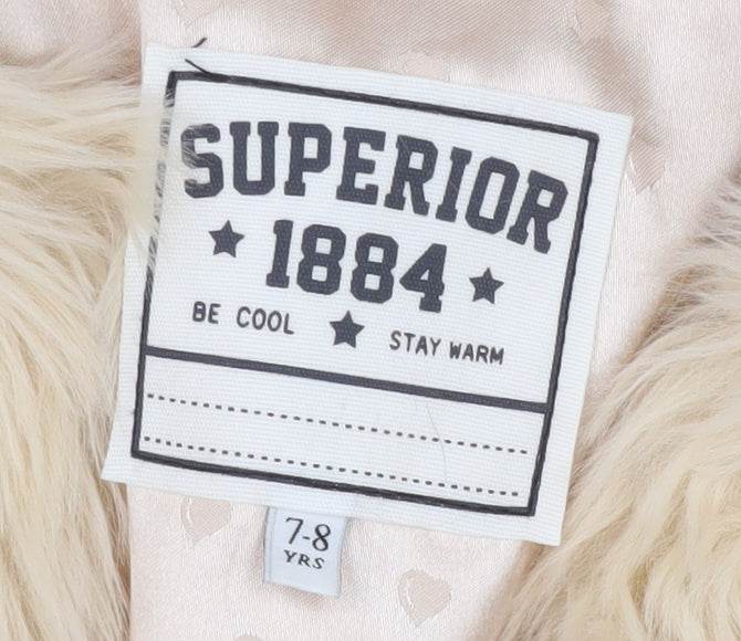 Brand and care label for Superior 1884 girls’ beige faux fur jacket, size 7-8, years