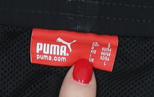 Close-up detail of Puma Men's Black Swim Shorts L Sports