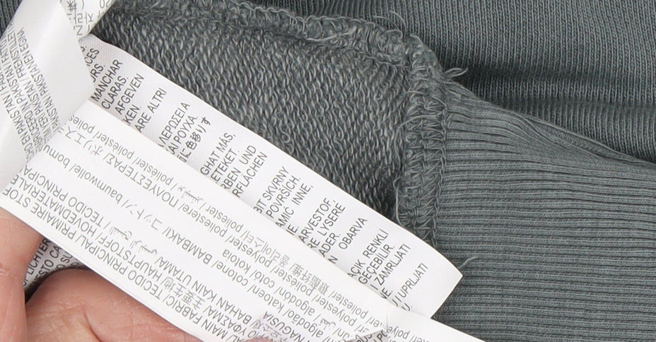 Brand and care label for Zara boys’ green crew neck pullover sweatshirt 13-14 years