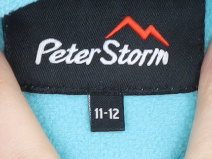 Brand and care label for Peter Storm girls’ blue fleece pullover sweatshirt, 11-12 years