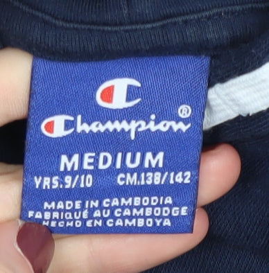 Brand and care label for Champion boys’ blue pullover hoodie, size 9-10, years
