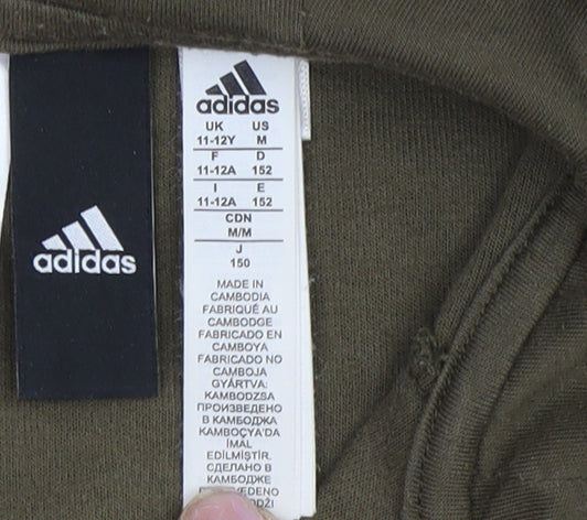 Close-up detail of Adidas boys’ green full zip hoodie 11-12 years