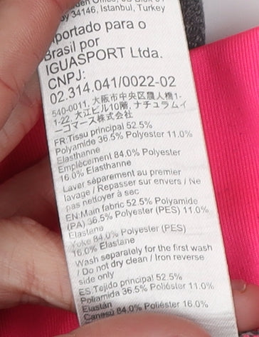 Brand and care label for Oxylane girls’ grey ankle leggings 2xs activewear
