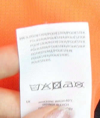 Brand and care label for Sondico boys’ orange football t-shirt 7-8 years