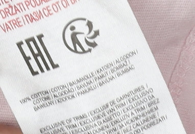 Brand and care label for Tokyo Laundry girls’ pink graphic t-shirt 7-8 years