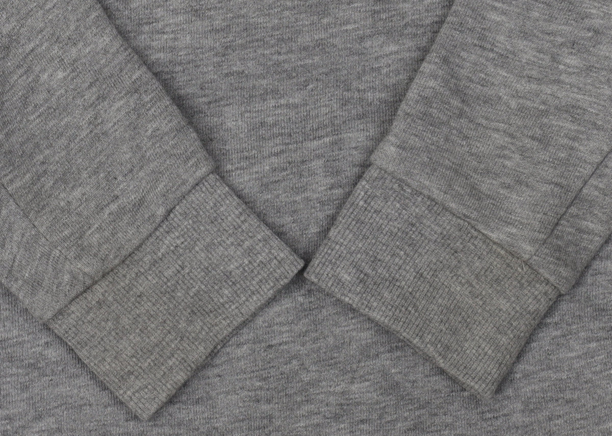 Brand and care label for Next boys’ grey hoodie, size 9-10, graphic print, casual wear