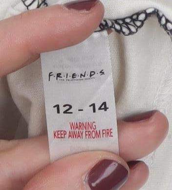 Brand and care label for Friends girls’ t-shirt 12-14 yrs black ivory central perk long sleeve