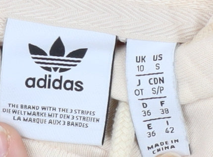 Brand and care label for Adidas Women Beige Crop Hoodie, size S, Cotton, Logo