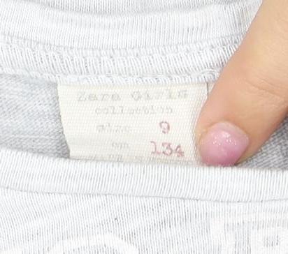 Close-up detail of Zara Kids girls’ multicoloured long sleeve graphic t-shirt 12-13y