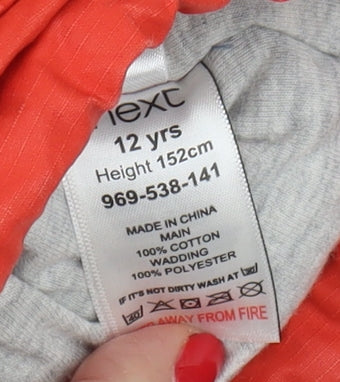 Close-up detail of Next boys’ red hooded parka jacket 12 years