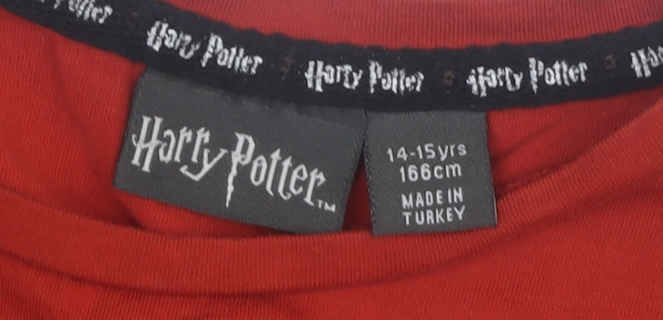 Close-up detail of Harry Potter girls’' red graphic t-shirt, 14-15 years, magical design