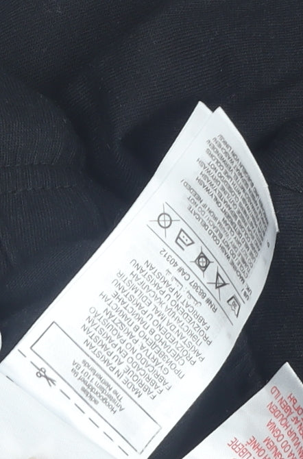 Brand and care label for Adidas boys’ black athletic shorts, 2-3 years, activewear