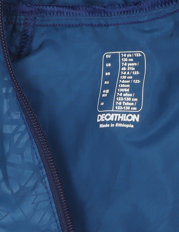 Brand and care label for Decathlon boys’ blue hooded jacket 7-8 years