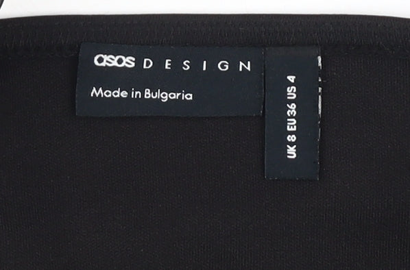 Close-up detail of ASOS DESIGN Women's Black Cropped Balloon Sleeve Top