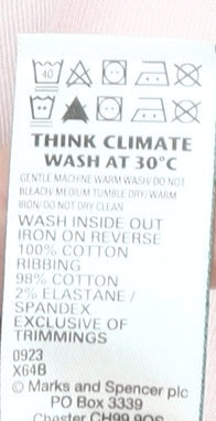 Brand and care label for Marks & Spencer girls’ pink graphic t-shirt 13-14 years
