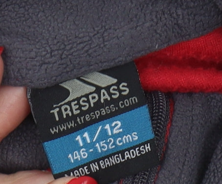 Brand and care label for Trespass boys’ red fleece sweatshirt 11-12 yrs pullover style