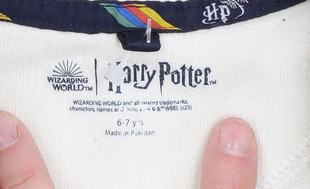 Brand and care label for Harry Potter boys’ white gryffindor sweatshirt 6-7 yrs