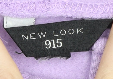 Brand and care label for New Look girls’' purple graphic sweatshirt, 12-13 years, pullover