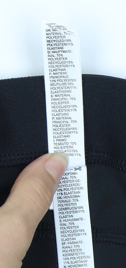 Brand and care label for Adidas Women's Black XS Cropped Running Leggings