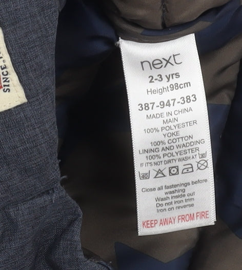 Close-up detail of Next boys’' hooded puffer jacket 2-3 years polyester