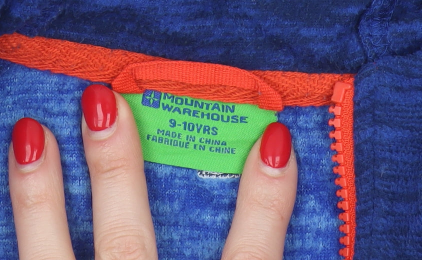 Brand and care label for Mountain Warehouse boys’ blue full zip hoodie 9-10 years