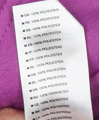 Brand and care label for Trespass girls’ purple full zip hoodie 9-10 years