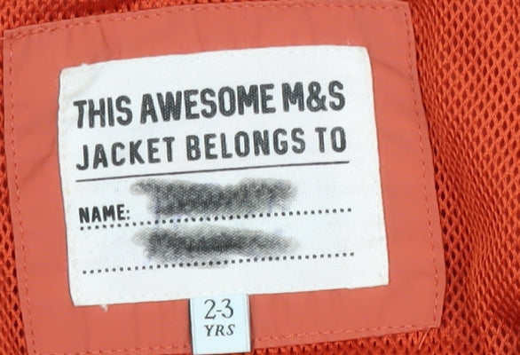 Brand and care label for Marks & Spencer boys’ orange hooded jacket 2-3 years