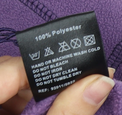 Brand and care label for TOG24 girls’ purple polyester jacket, size 13, years