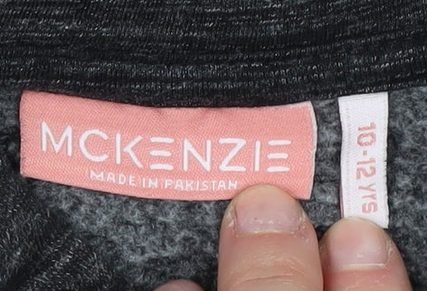 Close-up detail of McKenzie girls’ black pullover hoodie 10-11 years