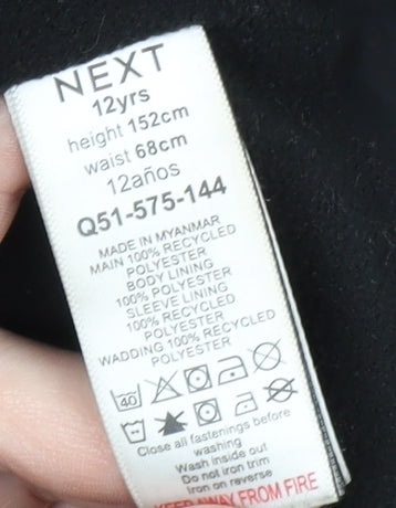 Brand and care label for Next boys’ black puffer jacket 12 years hooded zip winter