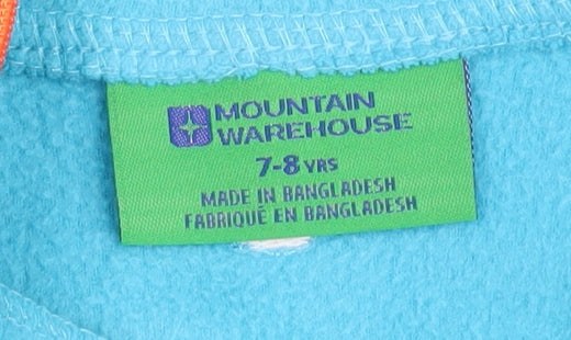 Brand and care label for Mountain Warehouse girls’ blue fleece hoodie 7-8 years