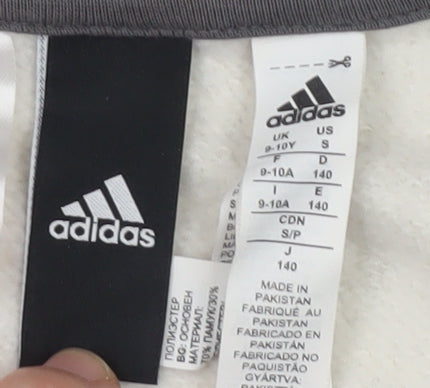 Brand and care label for Adidas boys’ full zip hoodie, black grey, 9-10 years