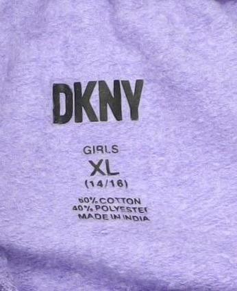 Close-up detail of DKNY girls’ purple jogger trousers xl activewear