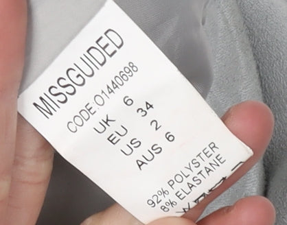Brand and care label for Missguided Women's Grey Cropped Biker Jacket, size 6
