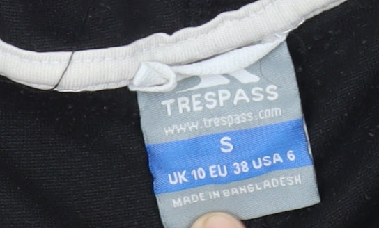Brand and care label for Trespass girls’ black hooded fleece jacket, size S