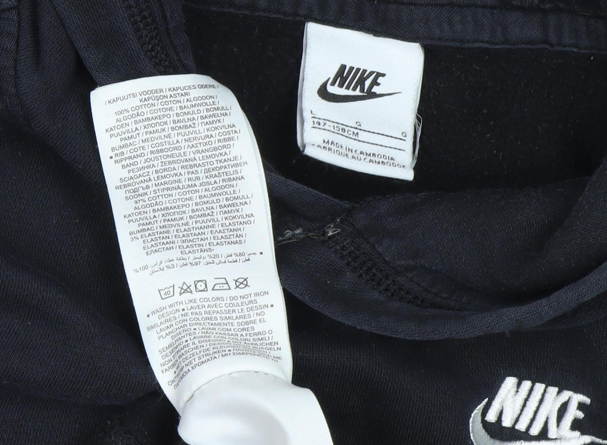 Close-up detail of Nike boys’ black pullover hoodie, size L