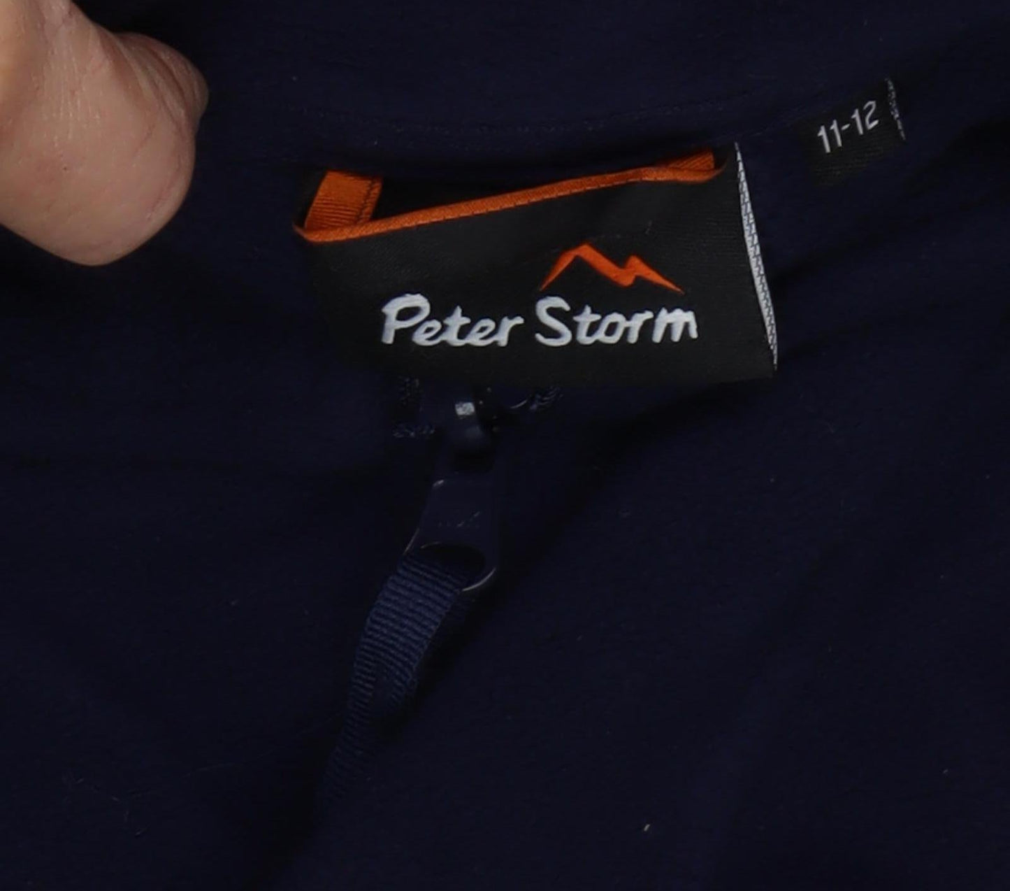 Close-up detail of Peter Storm boys’ black zip basic jacket 11-12 years outdoor