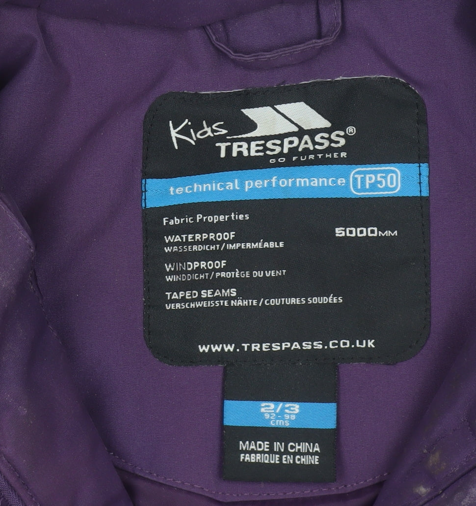 Brand and care label for Trespass Kids Purple Waterproof Jacket 2-3 Years, girls’