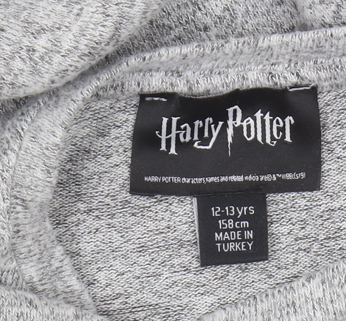 Brand and care label for Harry Potter girls’ grey long sleeve t-shirt 12-13 years
