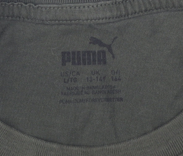 Close-up detail of Puma boys’ green t-shirt, size L, basic logo style