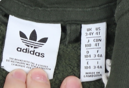Brand and care label for Adidas boys’ green hooded zip jacket 3-4 years