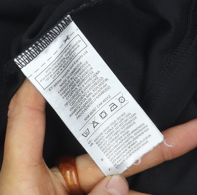 Brand and care label for Adidas boys’ black t-shirt 9-10 years gym jersey top