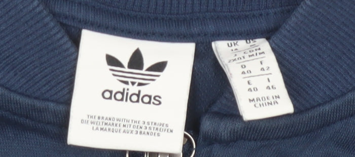 Brand and care label for Adidas Women's Blue Track Jacket, size 12