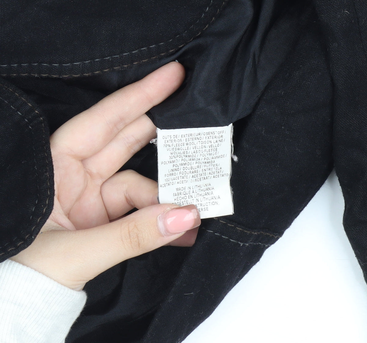 Brand and care label for Mexx Women's Black Wool Blazer, size 16