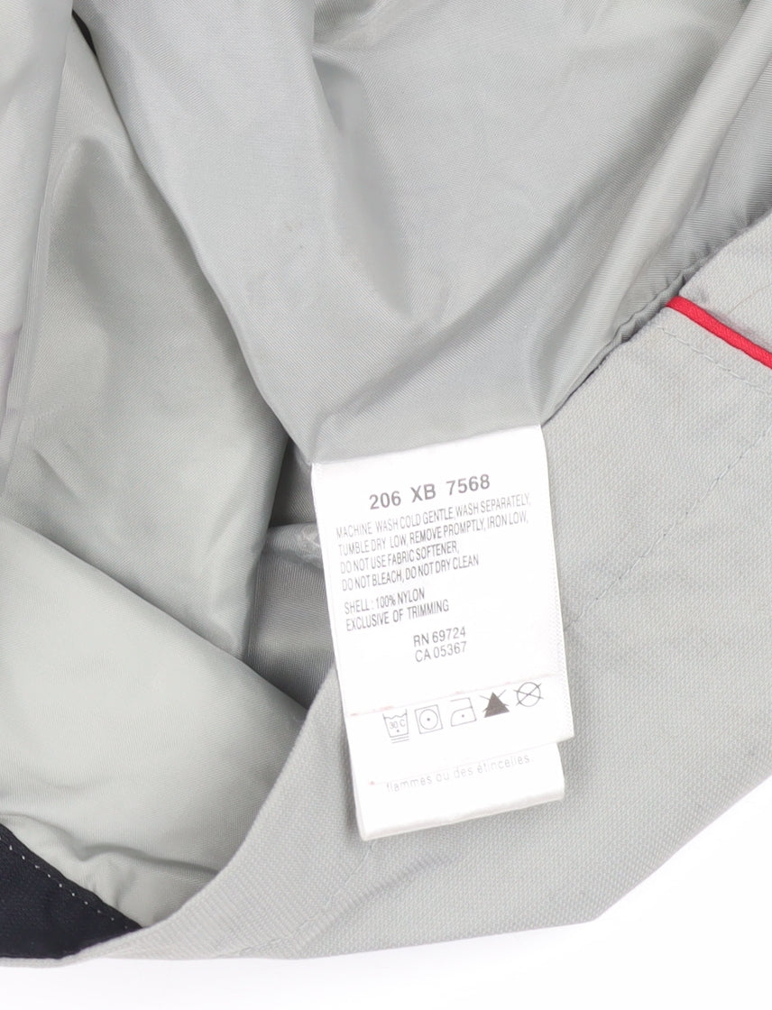 Brand and care label for Columbia boys’ grey parka jacket with hood in, size 14-15, years