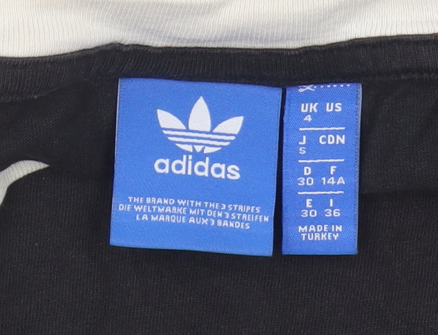 Close-up detail of Adidas Women's Black Ringer T-Shirt, size 4