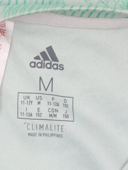 Close-up detail of Adidas boys’ green geometric t-shirt -, size 11-12, years